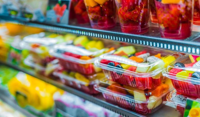 Packages,With,Fresh,Fruits,Displayed,In,A,Commercial,Refrigerator